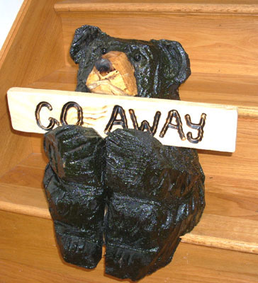 Bear Sitting on Step with Welcome/Go Away sign