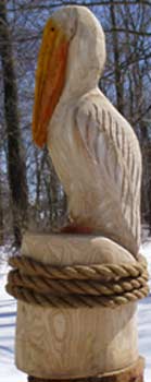 Pelican on base with rope